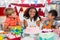 Siblings celebrating birthday in kitchen