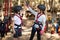 Siblings giving high five to each other in park