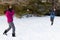 Siblings Having a Snowball Fight