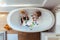 Siblings playing inside a bathtub