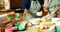 Siblings preparing food with family in kitchen 4k