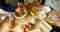 Siblings preparing food with family in kitchen 4k