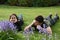 Siblings relaxing in garden