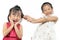 Siblings teasing, asian little girl pulling her sister\'s hair