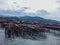 Sibolga, North Sumatra, Indonesia - July 24, 2022 : wooden arrangement in the sea for drying salted fish