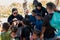 Sibuan, Malaysia - November 26, 2019: Visitors distributing snacks and goods to the Bajau Laut kids in their village