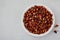 Sichuan pepper. Chinese pepper Zanthoxylum schinifolium in bowl, top view