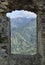 Sicilian island mountain landscape viewed through an ancient castle window