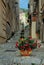 Sicilian street with traditional ceramics and flowers