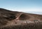 SICILY, ITALY - OCTOBER 1, 2018: People walking on the peak of Etna volcano. The biggest active mountain volcano in Europe