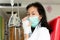 Sick asian child girl with medical mask having a cough,treatment from saline medicine with saline solution controller or infusion