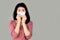 Sick Asian woman sneezing and coughing hand holding paper tissue covering her nose , suffer from flu and virus