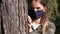 Sick Child Wearing Protective Mask due Coronavirus Pandemic, Sad Girl Isolated in Park, Bored Unhappy Teenager Kid Not Playing