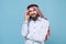 Sick concerned bearded arabian muslim man in keffiyeh kafiya ring igal agal casual clothes isolated on pastel blue