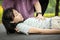 Sick daughter is fainted and fallen on floor while playing and exercise,asian mother help,take care, child girl with congestive