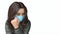 Sick flu young woman in face mask White background