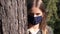 Sick Kid Wearing Protective Mask due Coronavirus Pandemic, Sad Girl Isolated in Park, Bored Unhappy Teenager Girl Not Playing