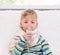 Sick little boy makes inhalation home