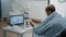 Sick man talking to doctor on video call for telemedicine