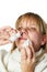 Sick with a rhinitis woman dripping nose medicine isolated