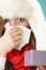 Sick woman sneezing in tissue. Winter cold.