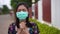 Sick woman wearing surgical mask medical mask is coughing, virus protection.
