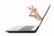 The side of the black laptop with The finger marked OK is protruding from the screen. isolated on white background with copy space