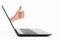 The side of the black laptop with The finger Thumbs up is protruding from the screen. isolated on white background with copy space