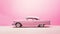 Side center shot of movie concept barbie doll\\\'s light pink classic car