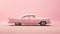 Side center shot of movie concept barbie doll\\\'s pink classic car