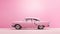 Side center shot of movie-themed barbie doll\\\'s light pink car