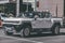 Side closeup of GMC Hummer EV electric truck standing outdoors