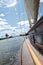 Side deck of a traditional yacht sailing on the Norfolk Broads