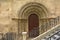 Side door of romanesque church of Santiago,