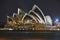 Side enlarged view of Sydney Opera House at night with nice reflection