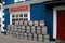 Side entrance to the famous Pat Collin\'s beer pub,with colorful beer kegs right outside,Adare,Ireland,October,2014