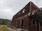 Side few of dilapidated mining cabin