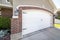 Side hinged white garage door with clipped corner design