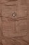 Side pocket of brown cargo pants
