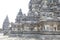 Side of the Prambanan main temple on white background