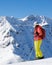 Side profile of a woman skier with colorful sport clothing at Arosa Lenzerheide ski resort, Switzerland. Vertical