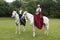 Side saddle riders at Victorias Garden party in Osborne House.