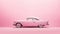 Side shot of barbie doll\\\'s pink classic car with barbie movie concept