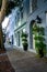 Side show of Rainbow Row houses with pot plants in Charleston, vertical shot