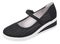 Side upper view of black and white perforated women suede shoe