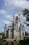 A side vertical view of Cinderellas Castle at Disney World in Orlando, Florida  on a beautiful sunny day