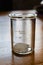 Side view of 40 mL chemistry beaker with sugar