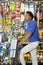 Side view of African American man with shopping cart at hardware store