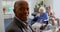 Side view of African American senior man smiling in nursing home 4k