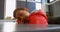 Side view of Asian schoolboy sleeping over the desk in classroom at school 4k